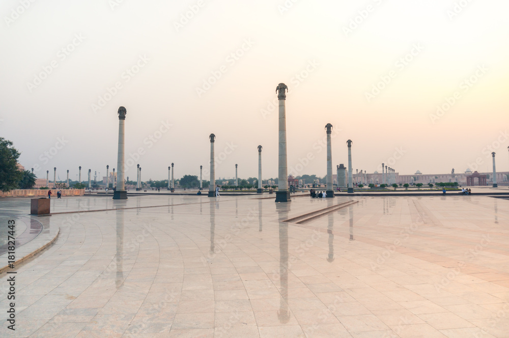 Pillars depecting elephants with their reflections on the ground. Shot at the famous landmark Ambedkar park in Lucknow