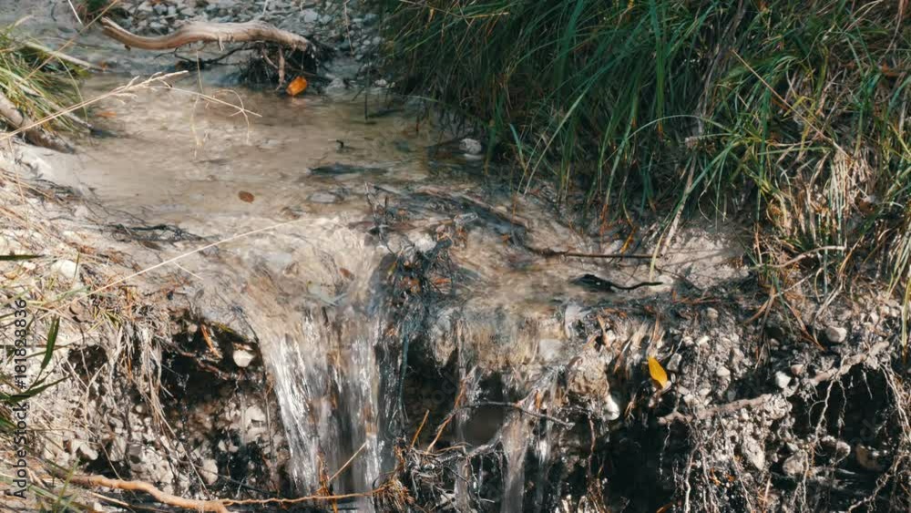 Raging flood waters river natural danger. Spring snow melt increases water flow into rivers and lakes Raging flood waters river natural danger. Spring snow melt increases water flow into rivers and lakes