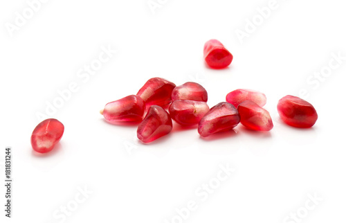 Fotografie Pomegranate grains isolated on white background.
