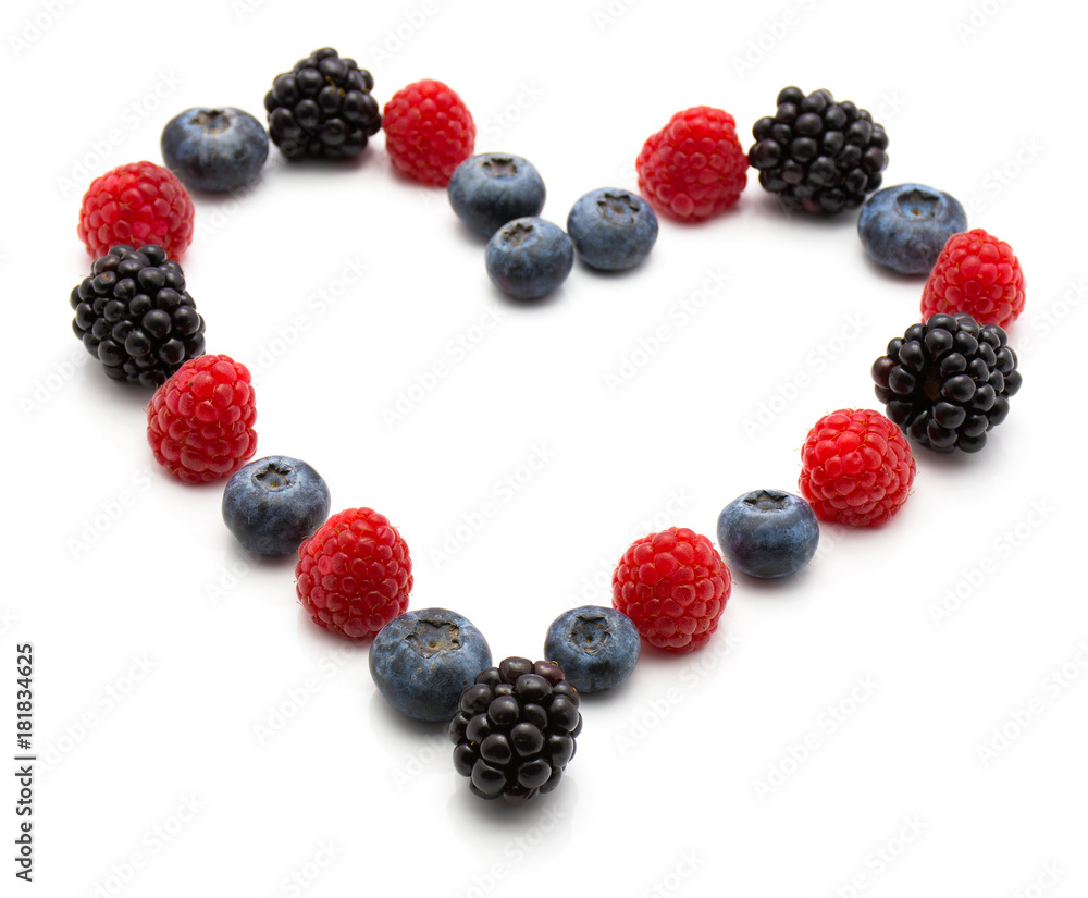 Heart by berries isolated on white background blackberry blueberry and raspberry. Heart by berries isolated on white background blackberry blueberry and raspberry.