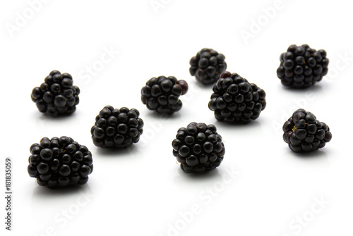 Fresh blackberries isolated on white background.