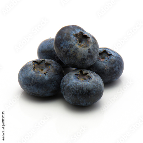 Bog blueberries isolated on white background heap of whole.