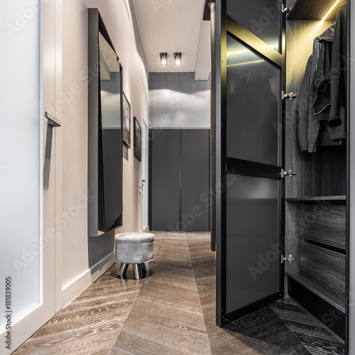 Home corridor with black wardrobe