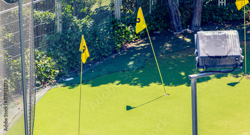 Obraz na płótnie mini golf practice in town with green and flags w salonie