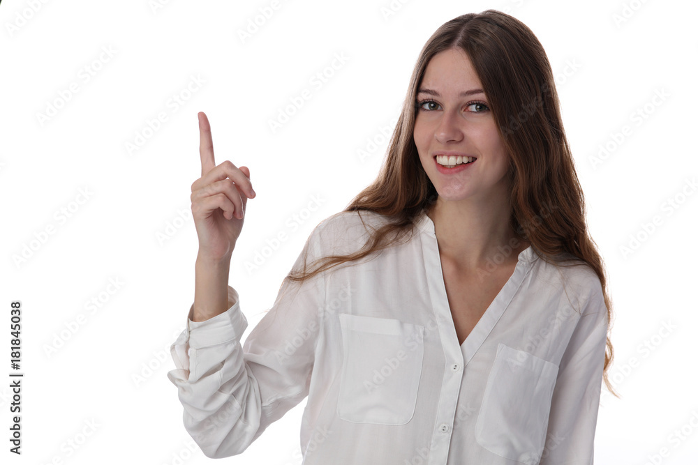 Portrait of happy smiling teenage girl student pointing up isolated od white backgroud Portrait of happy smiling teenage girl student pointing up isolated od white backgroud