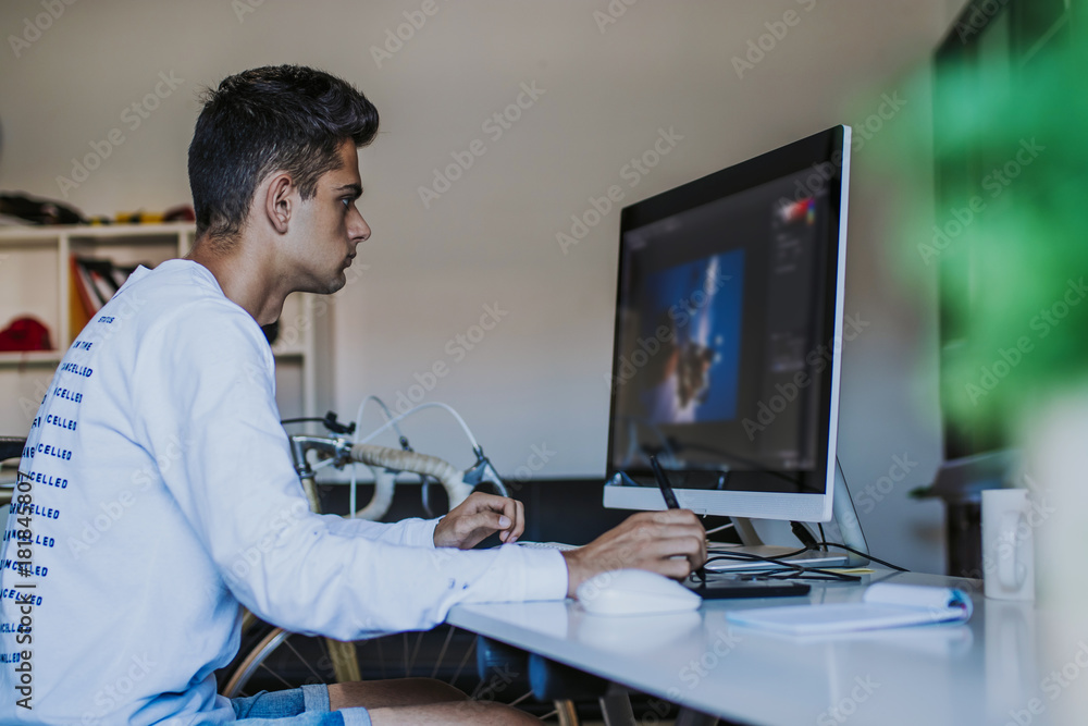 young working with the computer at home or in the office young working with the computer at home or in the office