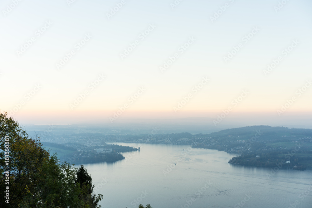 view of lake lucerne from buergenstock with fog switzerland