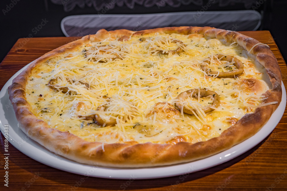 Very tasty pizza in a cafe restaurant Very tasty pizza in a cafe restaurant