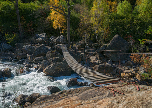 Suspension wood bridge to the river Selenginka
 photo