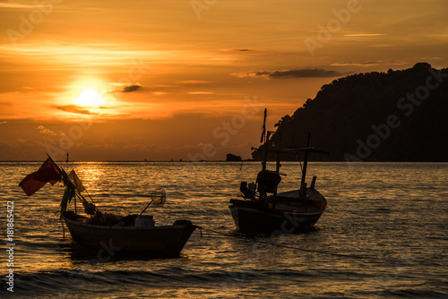 Sunset with Fisherman ships © Nichaphon