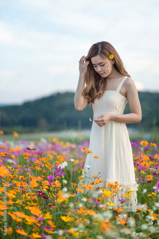 Asian beautiful woman standing in the park. Asian beautiful woman standing in the park.