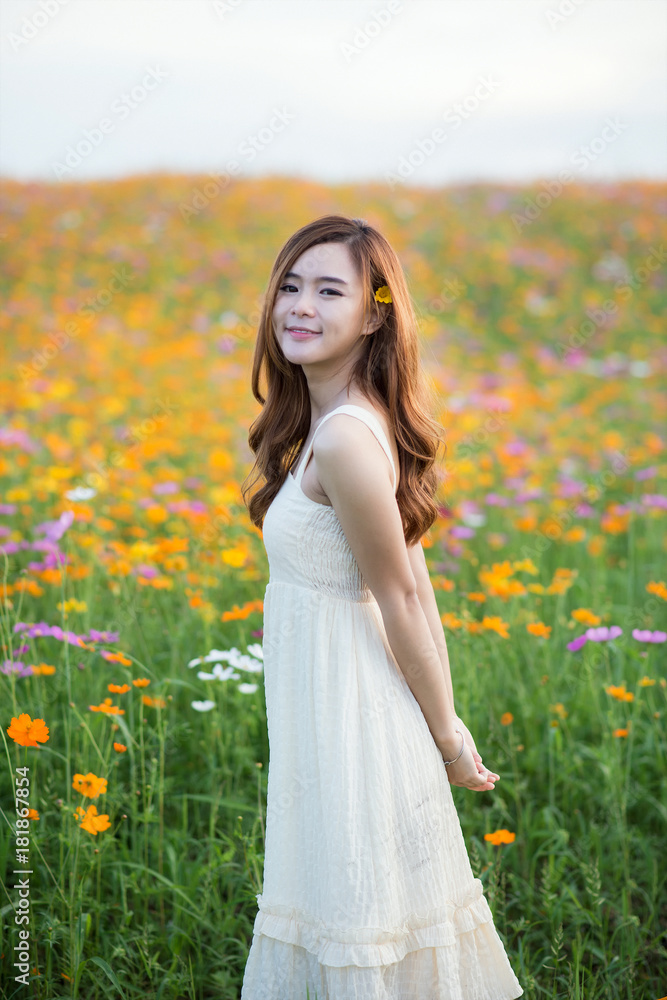 Asian beautiful woman standing in the park. Asian beautiful woman standing in the park.
