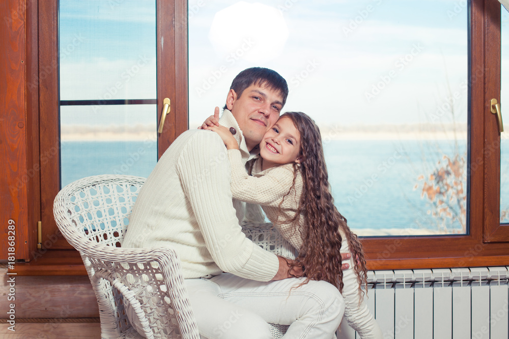 Happy father day Dad and his daughter child girl are playing, smiling and hugging. Family holiday and togetherness. Happy father day Dad and his daughter child girl are playing, smiling and hugging. Family holiday and togetherness.
