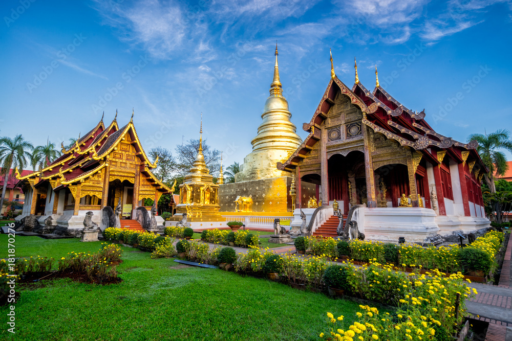 Fototapeta premium Sunrise scence of Wat Phra Singh temple. This temple contains supreme examples of Lanna art in the old city center of Chiang Mai,Thailand.
