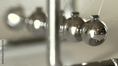 slow motion macro newtons cradle