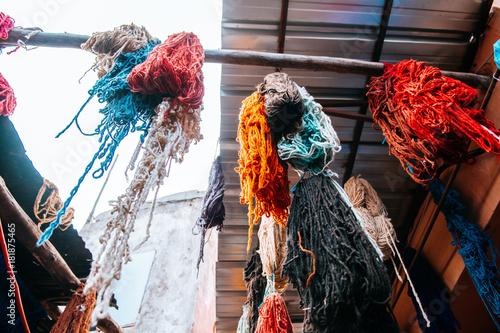 colorful wool hanging at dyers souks, marrakech photo