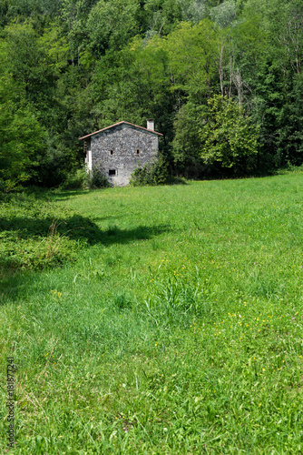 Stone house in the meadow