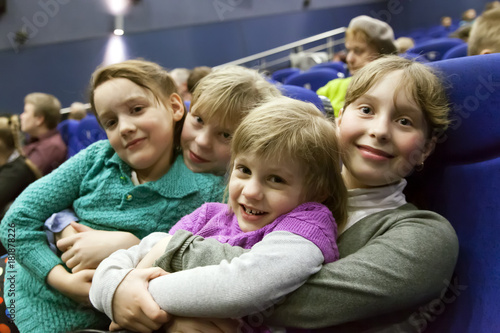 girl children in auditorium of theater.