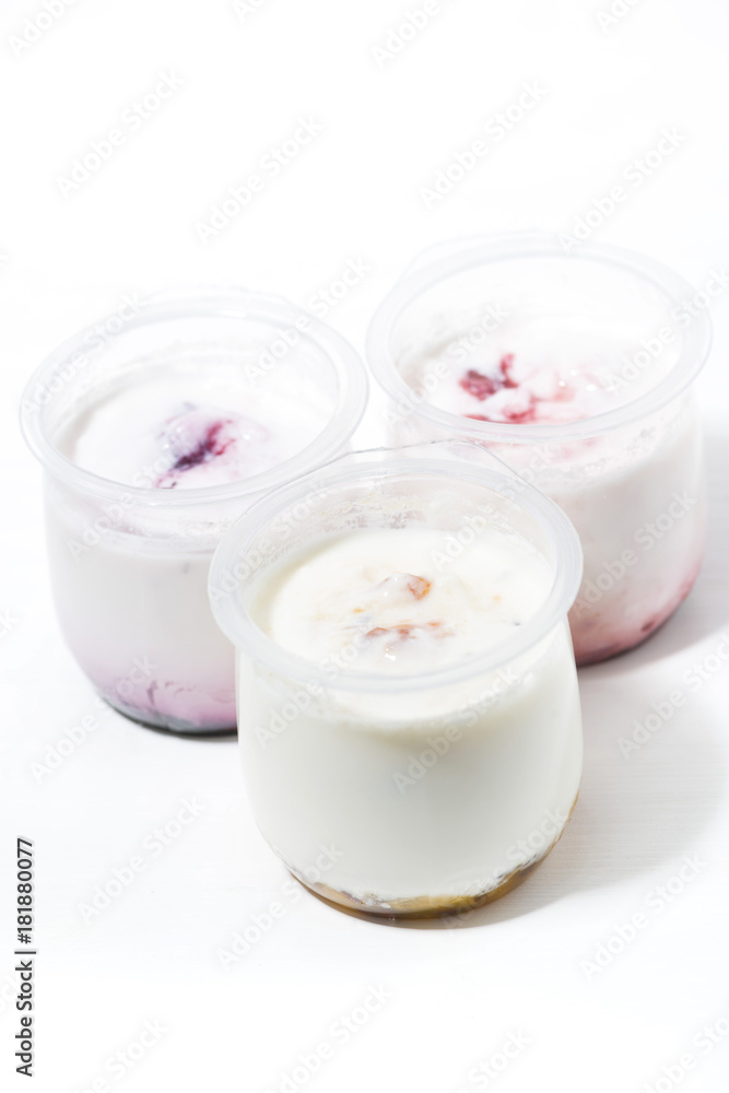 assortment of yogurts with fruit additives, vertical