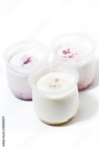 assortment of yogurts with fruit additives, vertical