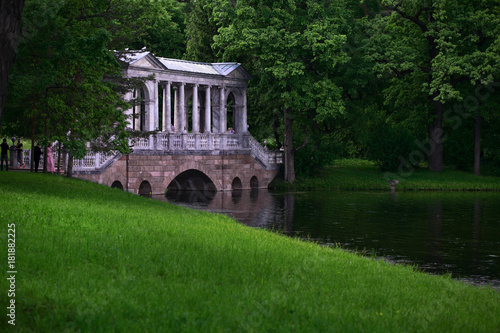 Petersburg, Russia - June 29, 2017: Marble Bridge in the park Tsarskoye Selo, Russia. photo