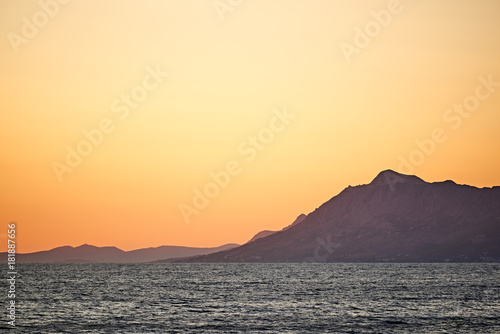 Beautiful Adriatic Sea bay with mountains on sunset