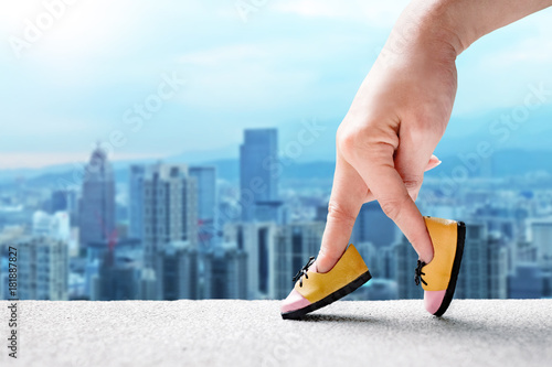 woman hand finger walking with shoe concept 