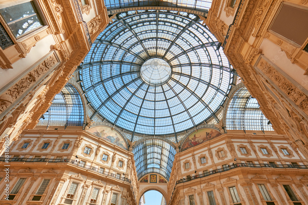 Milan, Vittorio Emanuele gallery interior, low angle view in a sunny day in Italy