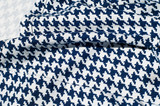 Texture, fabric, background. Fabric crochet pattern blue diamond pattern on white background