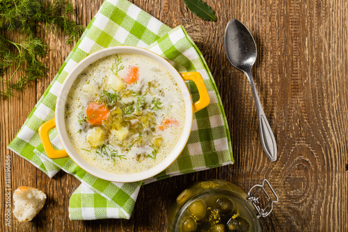 Traditional cucumber soup with pickled cucumbers.