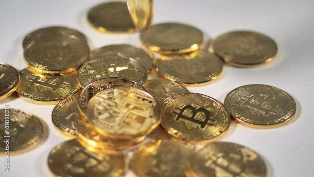 Cryptocurrency bitcoin on a desk. Gold Bitcoin BTC Bit Coin Cryptocurrency bitcoin on a desk. Gold Bitcoin BTC Bit Coin