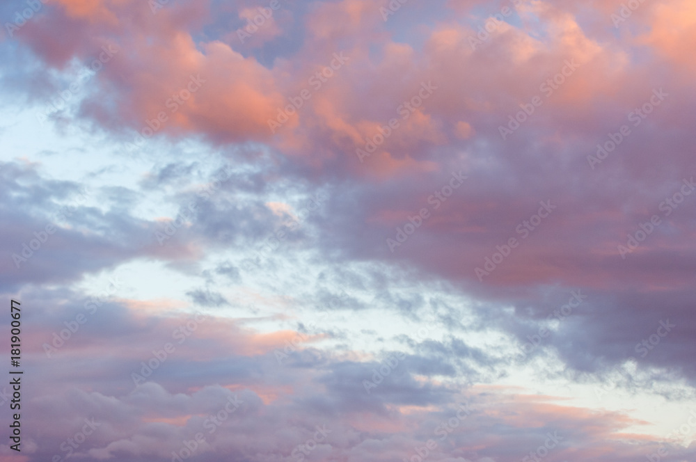  The sky is at sunset, dawn. Colored clouds, red, dark blue, orange, pastel colors. Romantic pastel sky at dusk. sky with dynamic dramatic expressive cloudsdramatic, dusk, dawn, red, sunrise, evening,