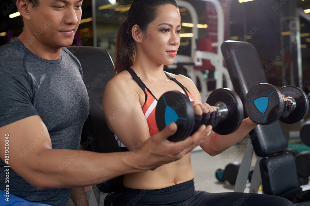 Fototapeta premium Working out with trainer