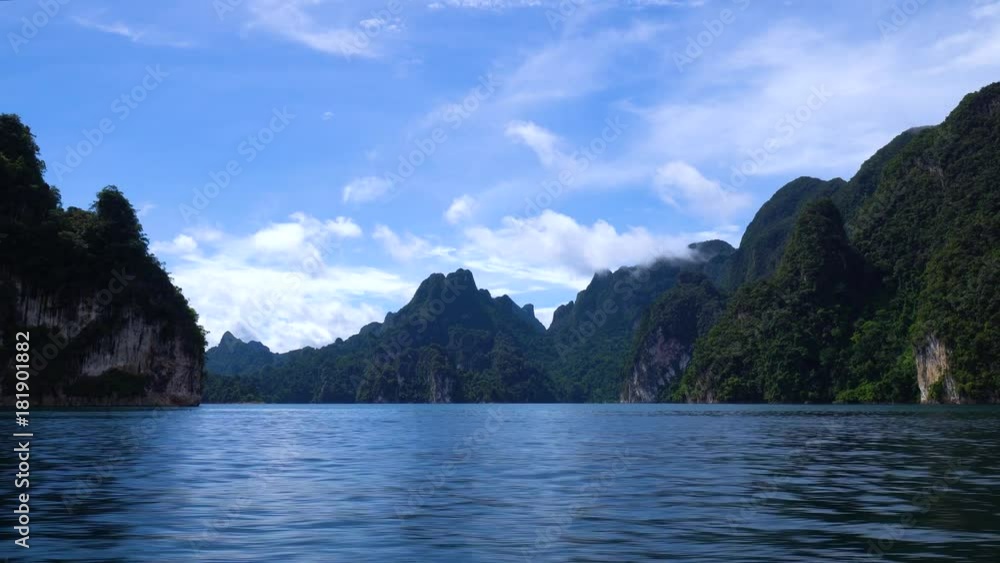Beautiful mountains and sky with clouds on Cheow Lan lake. Khao Sok. Thailand. Beautiful mountains and sky with clouds on Cheow Lan lake. Khao Sok. Thailand.