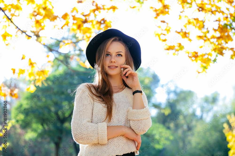 Happy teen girl walking on autumn park. Happy relax time in city. Happy teen girl walking on autumn park. Happy relax time in city.