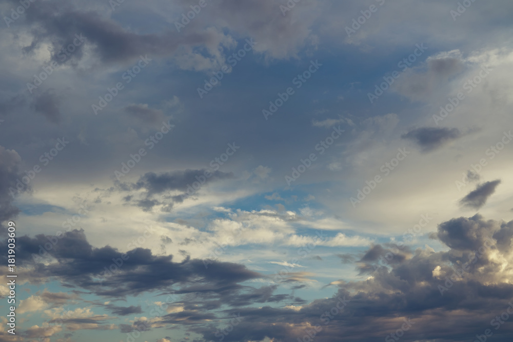 Fototapeta premium Rainy clouds flying over horizon at beautiful evening.