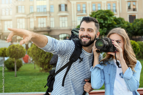 Couple of young tourists ta...