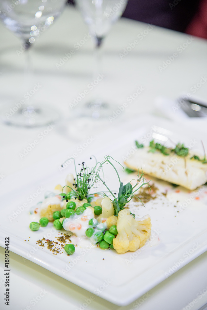 Chef s specialty presented in restaurant on served table Chef s specialty presented in restaurant on served table