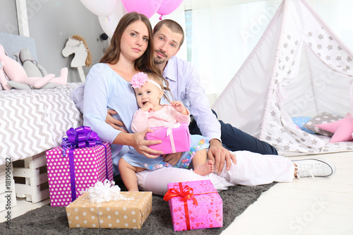 Young family and cute baby ...