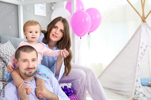 Young family and cute baby ...