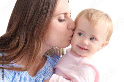 Young mother holding cute b...