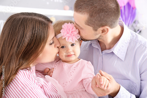 Young family and cute baby ...