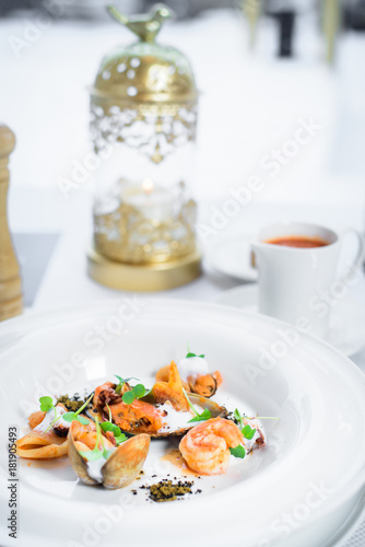 Chef s specialty presented in restaurant on served table