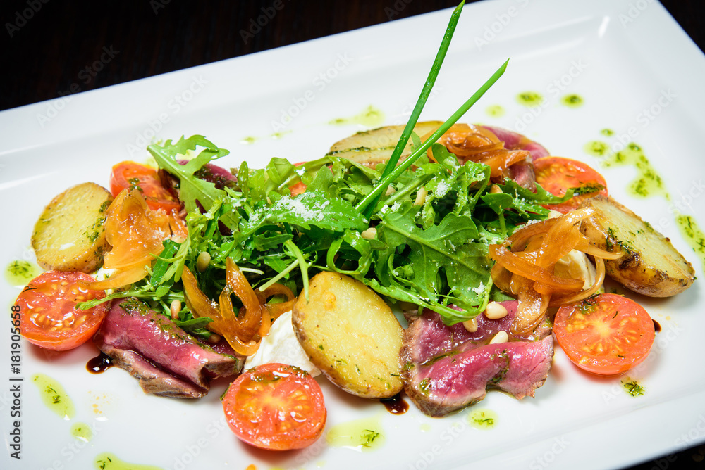 Chef s specialty presented in restaurant on served table