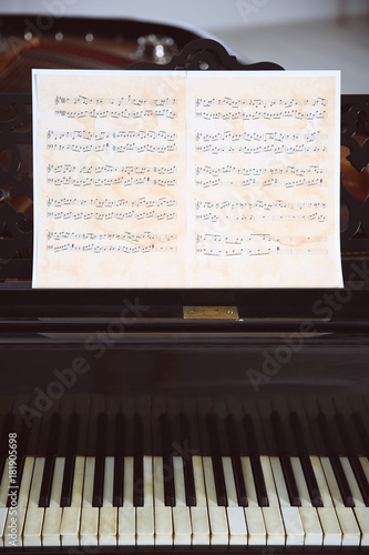 Music sheets on piano
