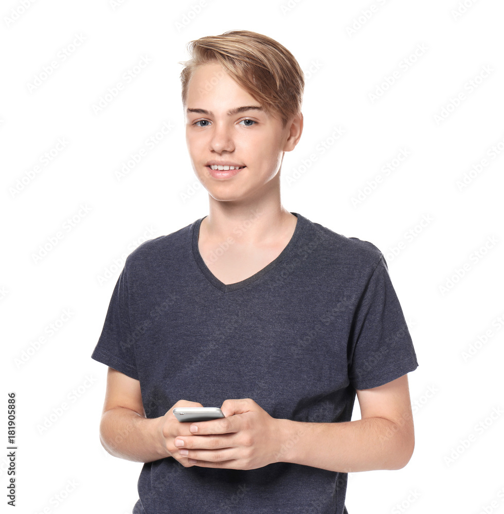 Teenager boy with mobile phone on white background Teenager boy with mobile phone on white background