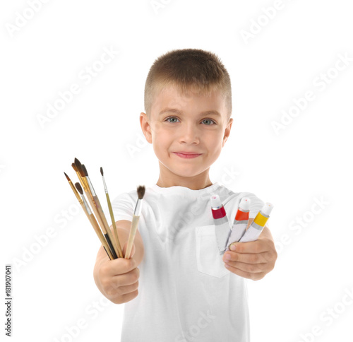 Cute little boy with paints...