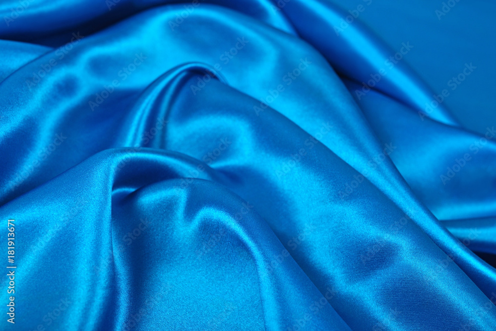 Natural blue satin fabric texture background Natural blue satin fabric texture background