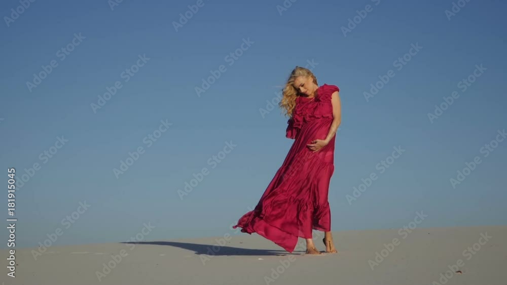 a girl in the sand dunes a girl in the sand dunes