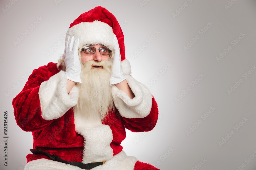 surprised santa claus looks to side surprised santa claus looks to side